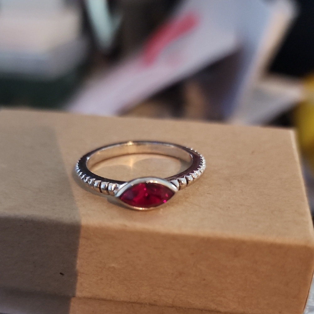 Elegant Silver Ring with Red Gemstone